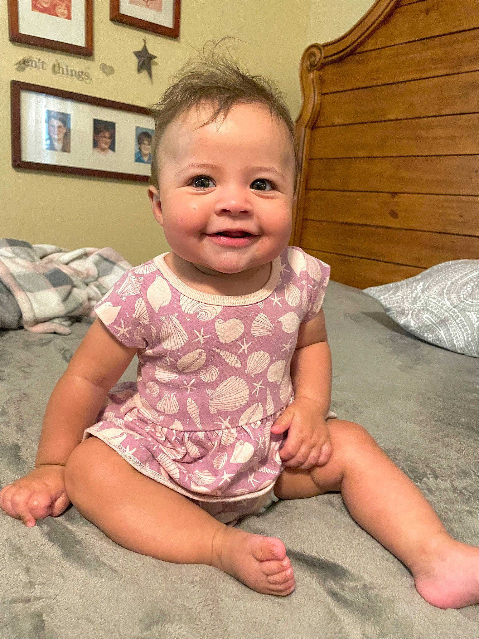 Braelyn is registered to the contest to win money with this photo: baby, baby_toddler_clothing, blurred, cheek, chin, comfort, eye, facial_expression, floor, hairstyle, human_body, iris, joy, mammal, mouth, nose, person, picture_frame, shoulder, skin