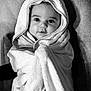 Solann a rejoint le concours — aidez-le/la à gagner de superbes lots ! baby, towel, hood, wrapped, black_and_white, portrait, infant, face, closeup, soft_texture, cute, child, indoors, blanket, warm, smiling, person, newborn, comfort, candid