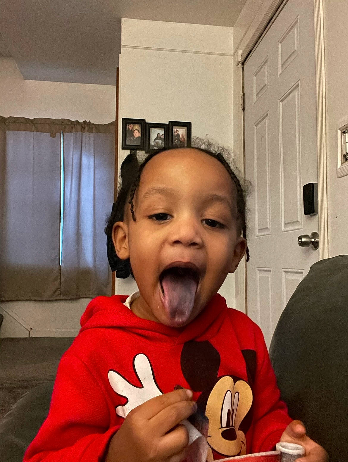 Dakari joined the competition — help win amazing prizes! baby, carmine, cheek, child, coffee_cup, comfort, curtain, door, eyelash, fun, gesture, happy, lip, mouth, nose, person, room, sitting, tableware, thumb