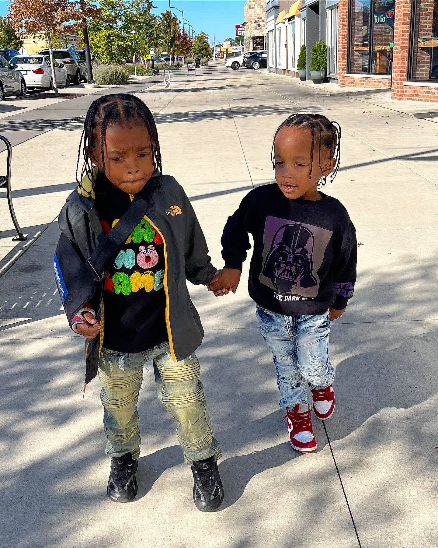 Dakari joined the competition — help win amazing prizes! asphalt, child, cool, fun, gesture, hairstyle, happy, human, leisure, morning, person, public_space, recreation, shoe, sidewalk, sneakers, standing, t_shirt, toddler, travel