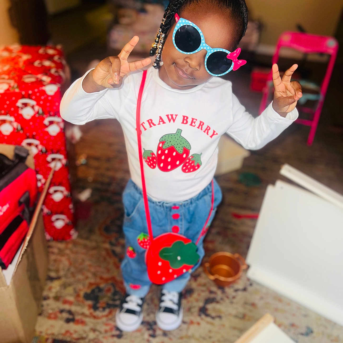 Olivia is registered to the contest to win money with this photo: accessories, bodypart, child, clothing, face, female, finger, footwear, girl, glasses, hand, head, jeans, pants, person, photography, portrait, shoe, sunglasses, t_shirt