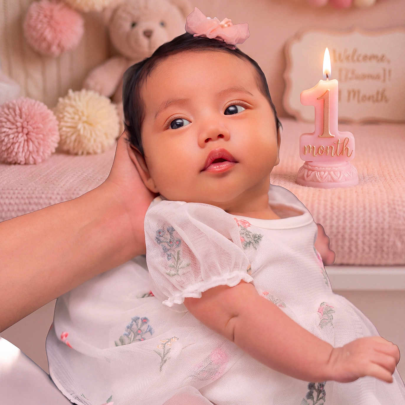 Cherry is registered to the contest to win money with this photo: baby, infant, child, portrait, sitting, bow, dress, floral_pattern, pink, pastel, birthday, candle, one_month_old, teddy_bear, pom_poms, nursery, blanket, indoor, smiling, face