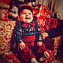 baby, child, christmas, holiday, presents, gifts, tree, smiling, happy, red_clothing, bow_tie, cap, sitting, indoors, festive, celebration, decorations, sock, person, portrait