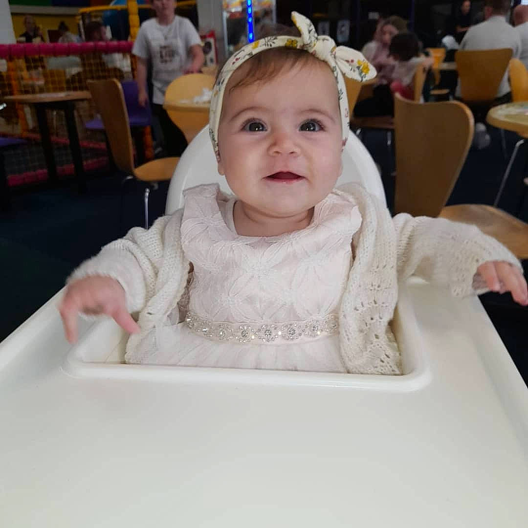Ellie Mae joined the competition — help win amazing prizes! baby, baby_toddler_clothing, blurred, chair, cheek, child, comfort_food, event, fun, gesture, hairstyle, happy, laugh, person, recreation, room, sitting, sleeve, smile, table