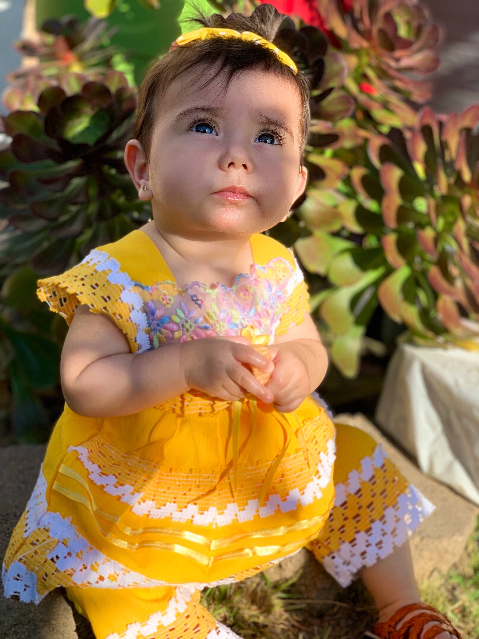 Estrella joined the competition — help win amazing prizes! baby, baby_toddler_clothing, child, dress, person, smile, toddler, yellow