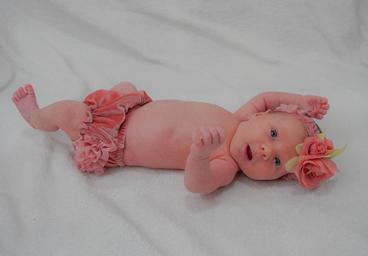 Lakelynn is registered to the contest to win money with this photo: baby, baby_products, baby_toddler_clothing, child, comfort, doll, eye, fashion_accessory, finger, foot, hair_accessory, headgear, headwear, nail, peach, person, pink, skin, toddler, toy