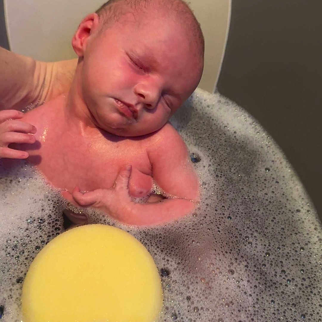 Hallie-Rae joined the competition — help win amazing prizes! baby, bathing, bathtub, childbirth, face, head, newborn, person, photography, portrait, soap, sponge, tub