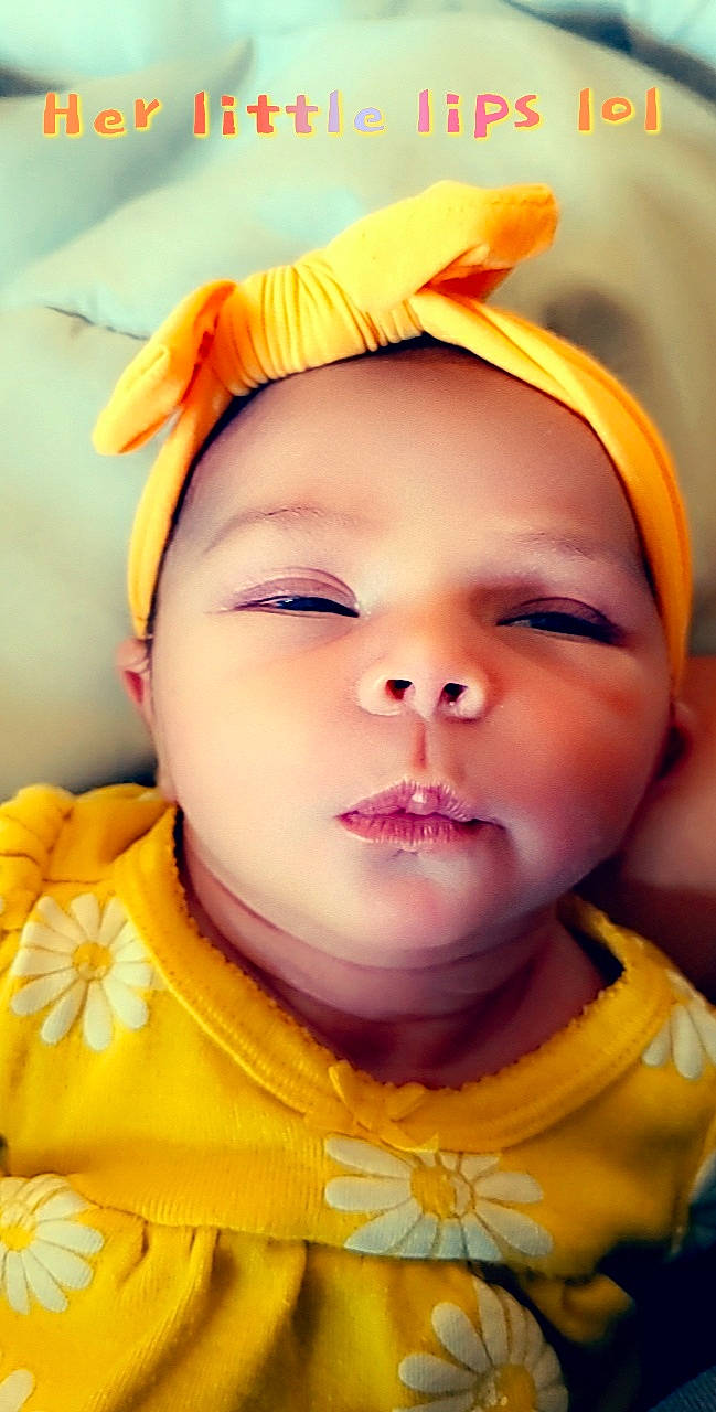 Bradie is registered to the contest to win money with this photo: baby, cheek, child, chin, close_up, ear, eye, eyebrow, eyelash, face, head, headgear, headwear, lip, mouth, nose, person, skin, smile, toddler
