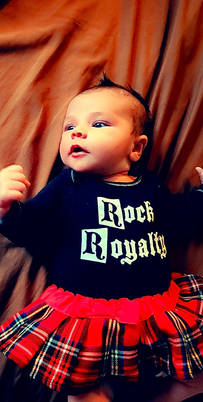 Bradie is registered to the contest to win money with this photo: baby, child, child_model, design, pattern, person, plaid, tartan, textile, toddler