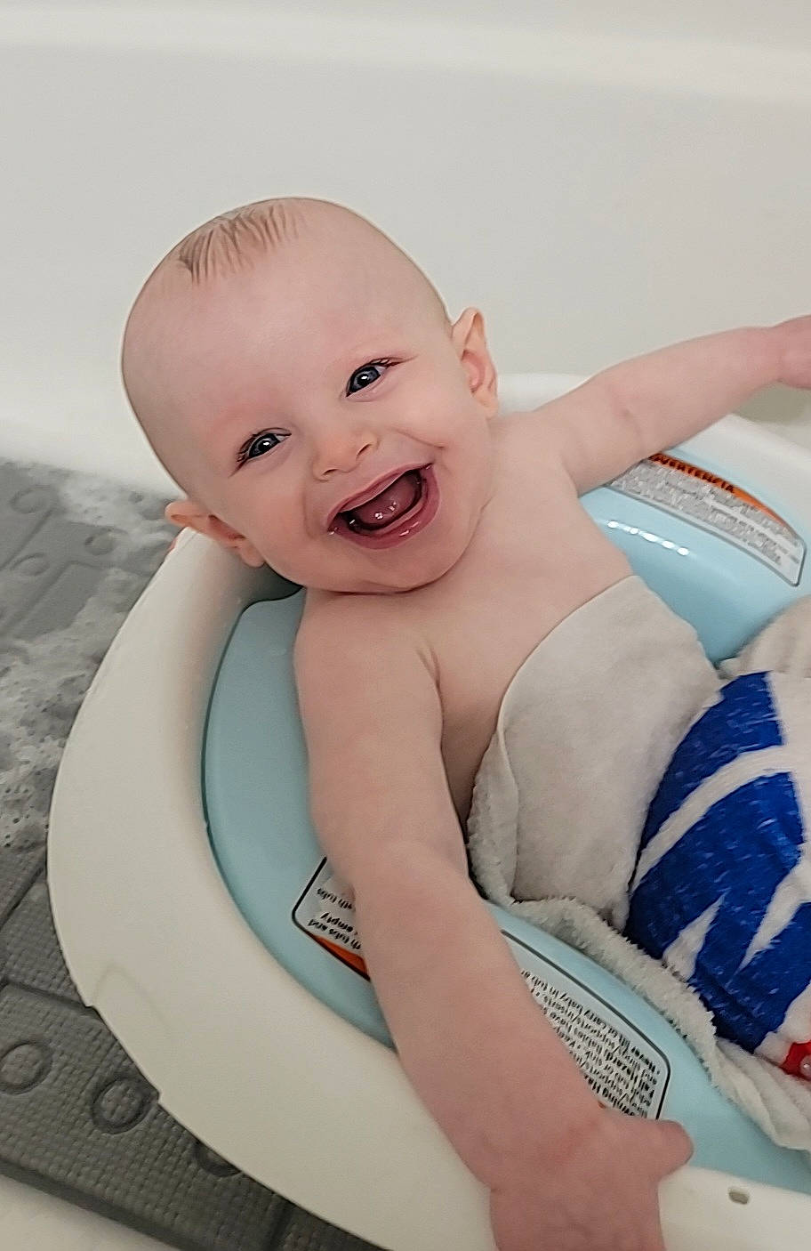 E.j. joined the competition — help win amazing prizes! abdomen, aqua, baby, baby_laughing, baby_products, baby_toddler_clothing, bathing, child, comfort, elbow, fun, gesture, happy, joy, person, product, sitting, skin, smile, stomach