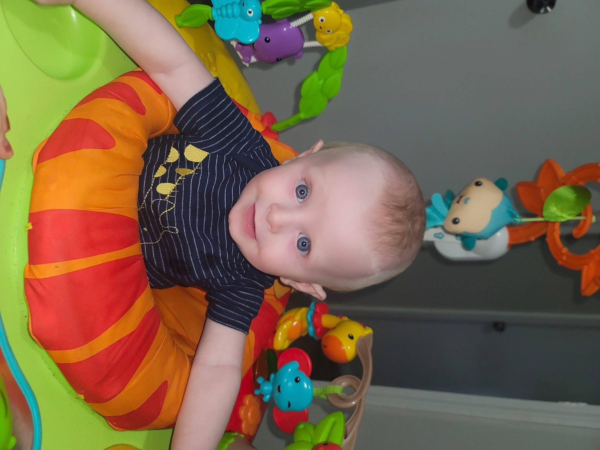 E.j. is registered to the contest to win money with this photo: baby, baby_playing_with_toys, baby_products, baby_toddler_clothing, baby_toys, cheek, child, event, fun, happy, leisure, organ, party_supply, person, play, product, room, smile, stuffed_toy, toddler
