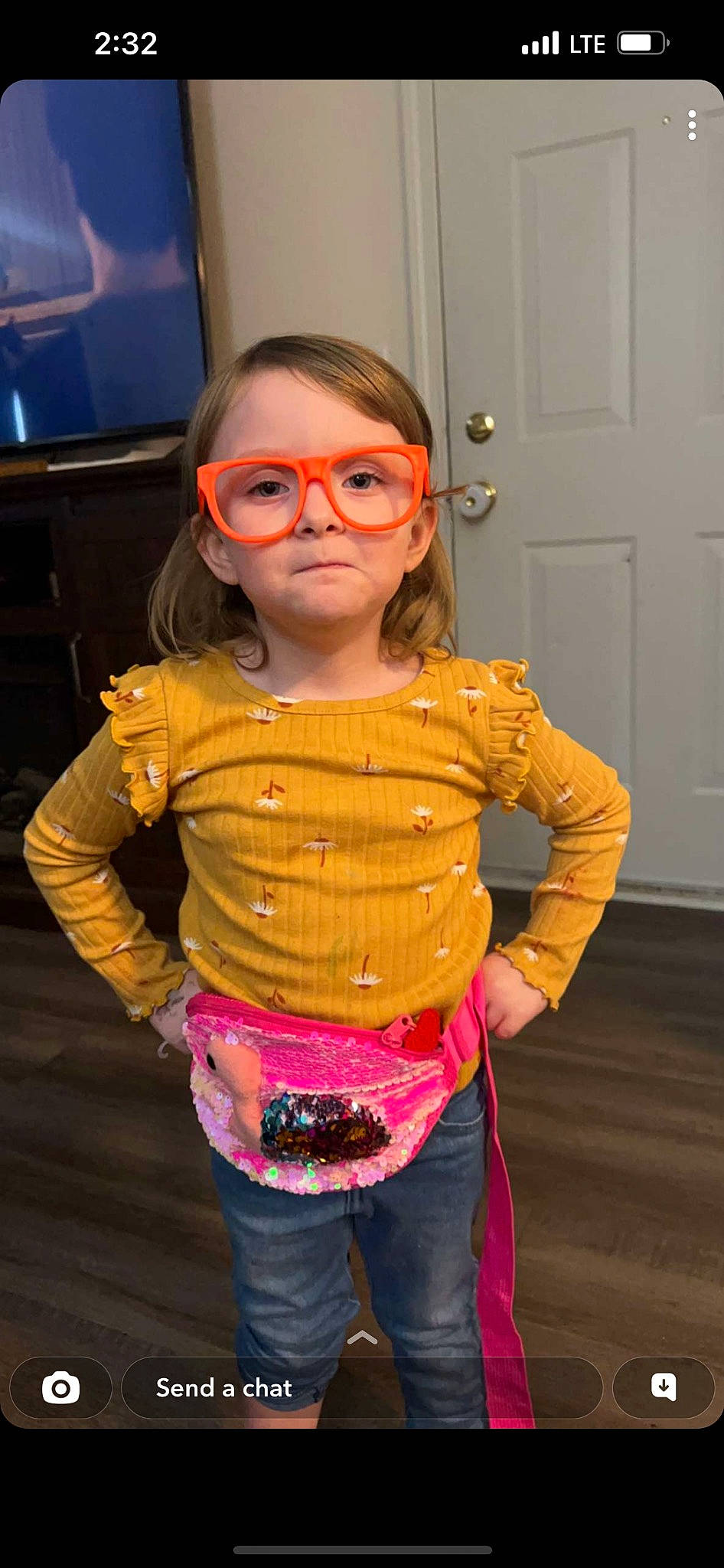 Skyla joined the competition — help win amazing prizes! baby_toddler_clothing, cheek, chin, clothing, cool, door, eyewear, fashion_design, flooring, goggles, hair, head, mouth, nose, person, pink, sleeve, t_shirt, television, toddler