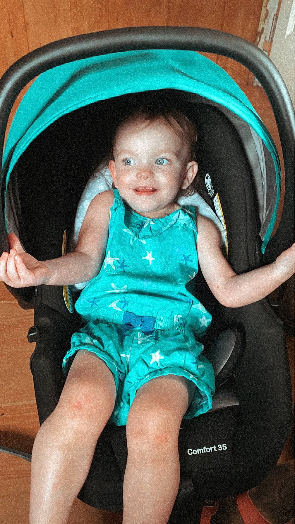 Stella is registered to the contest to win money with this photo: aqua, baby_carriage, baby_toddler_clothing, beauty, blue, chair, child, comfort, eye, finger, flash_photography, fun, happy, joy, leisure, mouth, person, photograph, product, skin