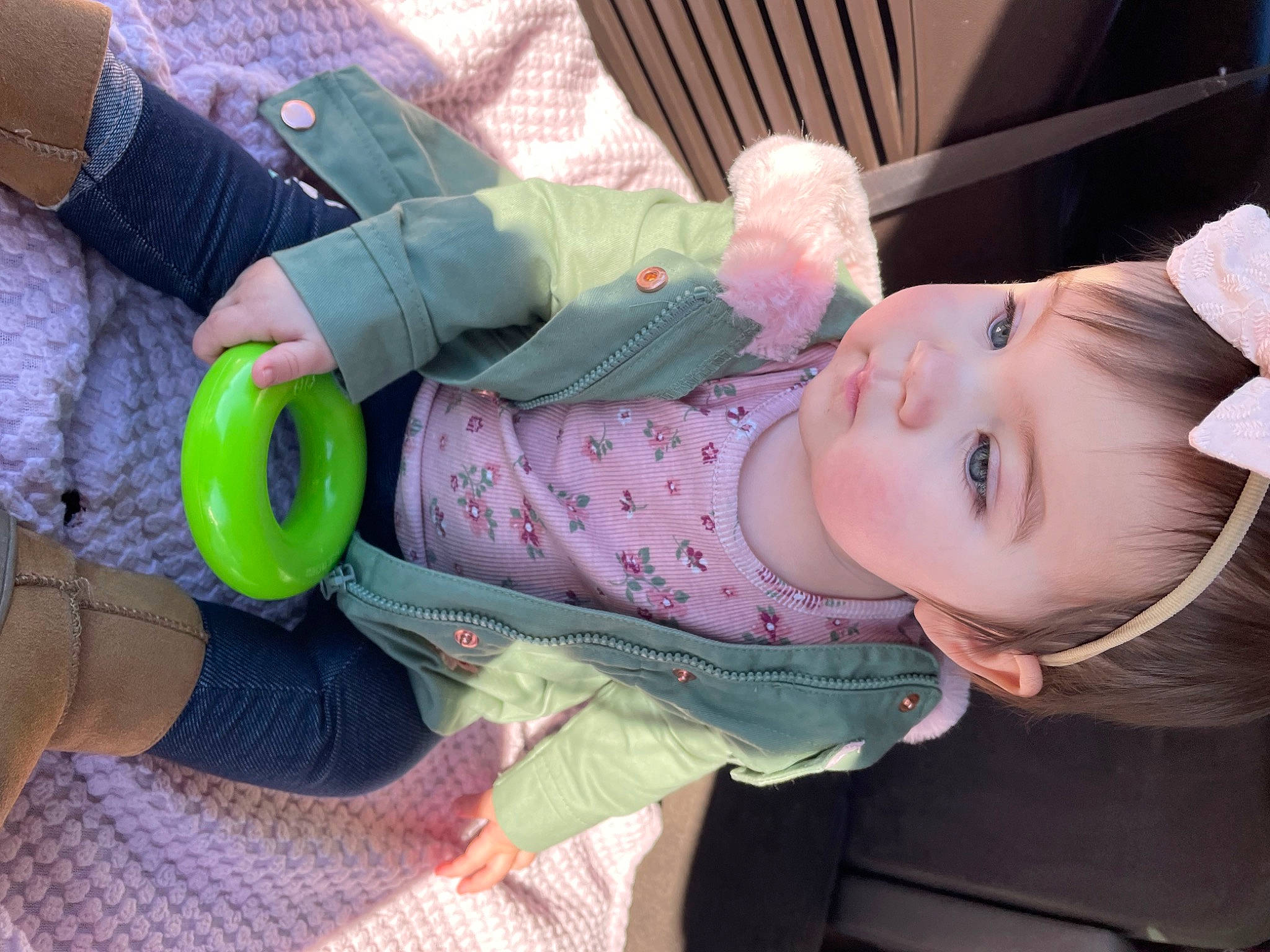 Reagan is registered to the contest to win money with this photo: baby, baby_carriage, baby_products, baby_toddler_clothing, cheek, child, comfort, fun, hand, mouth, pattern, person, pink, product, sitting, skin, sleeve, smile, thumb, toddler
