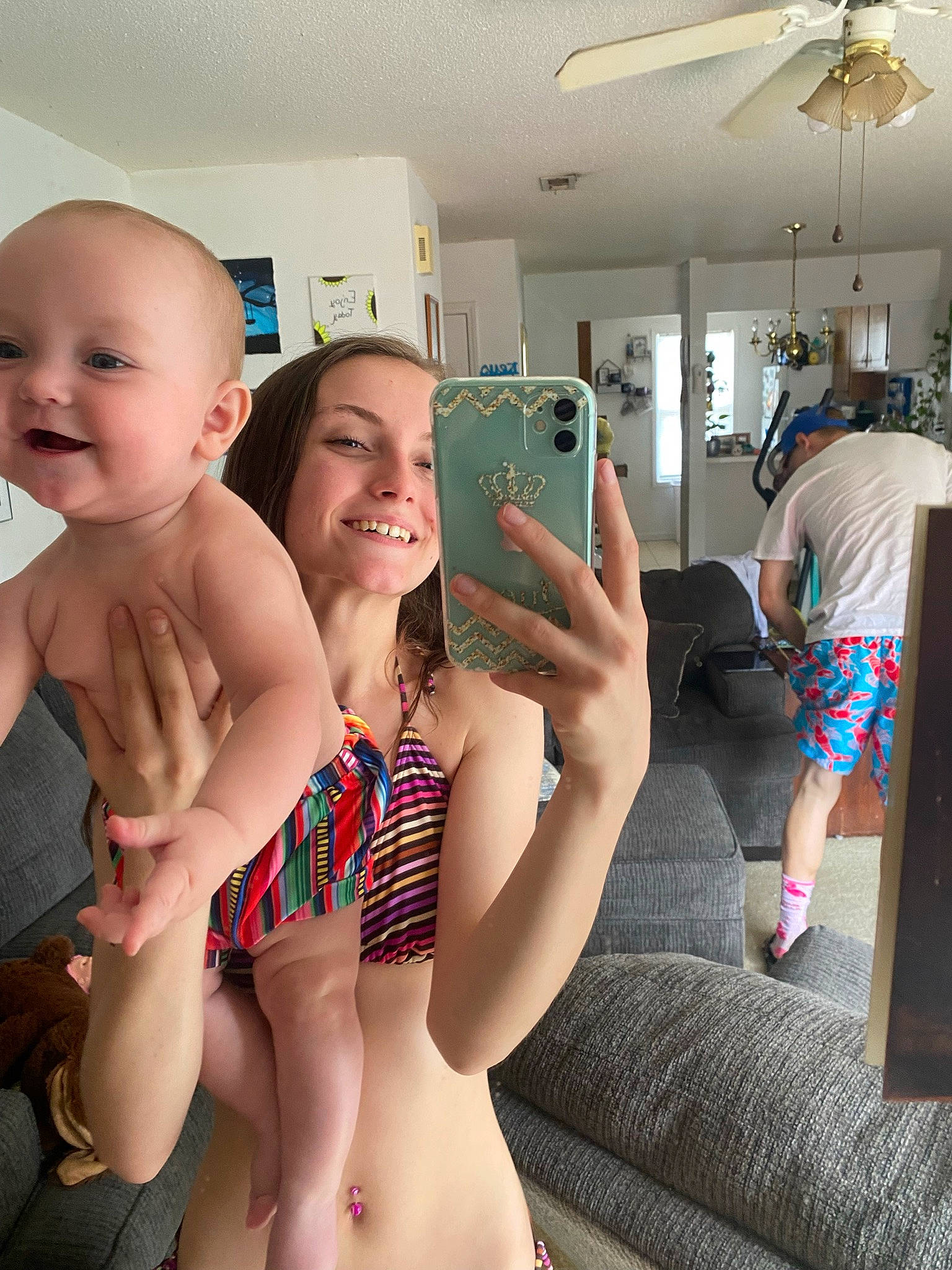 Nevaeh is registered to the contest to win money with this photo: abdomen, brassiere, ceiling_fan, chest, fun, happy, joy, leg, leisure, mechanical_fan, muscle, person, recreation, skin, smile, swimwear, thigh, thumb, toddler, trunk