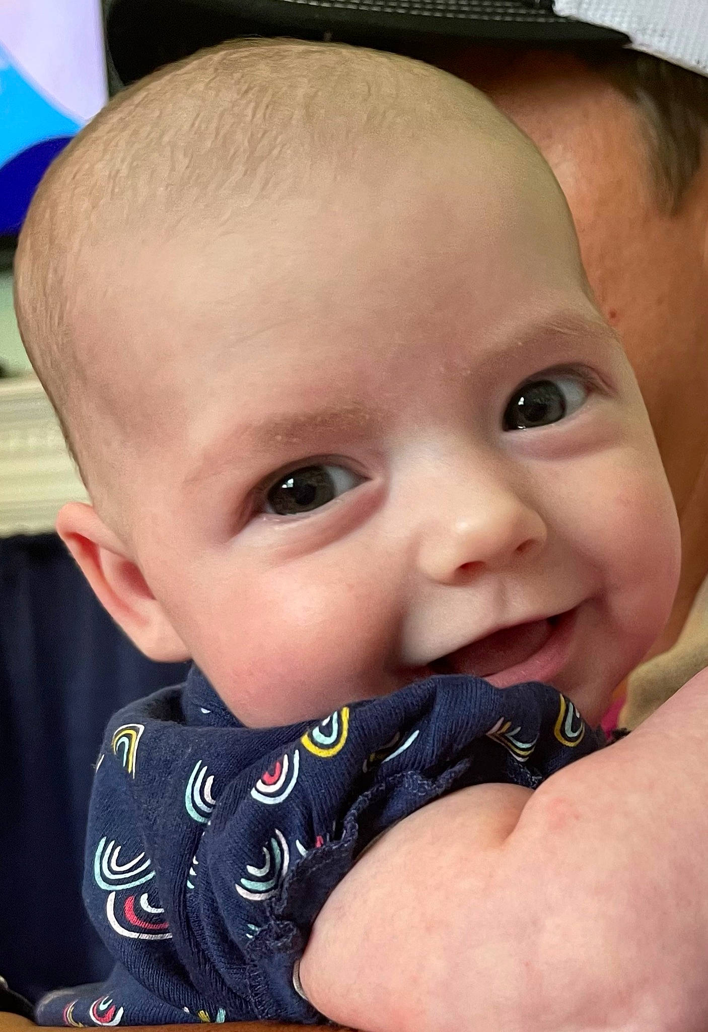 Gemma is registered to the contest to win money with this photo: baby, baby_toddler_clothing, cheek, chin, ear, eyebrow, eyelash, facial_expression, finger, forehead, gesture, hand, happy, iris, lip, mouth, nose, person, skin, smile