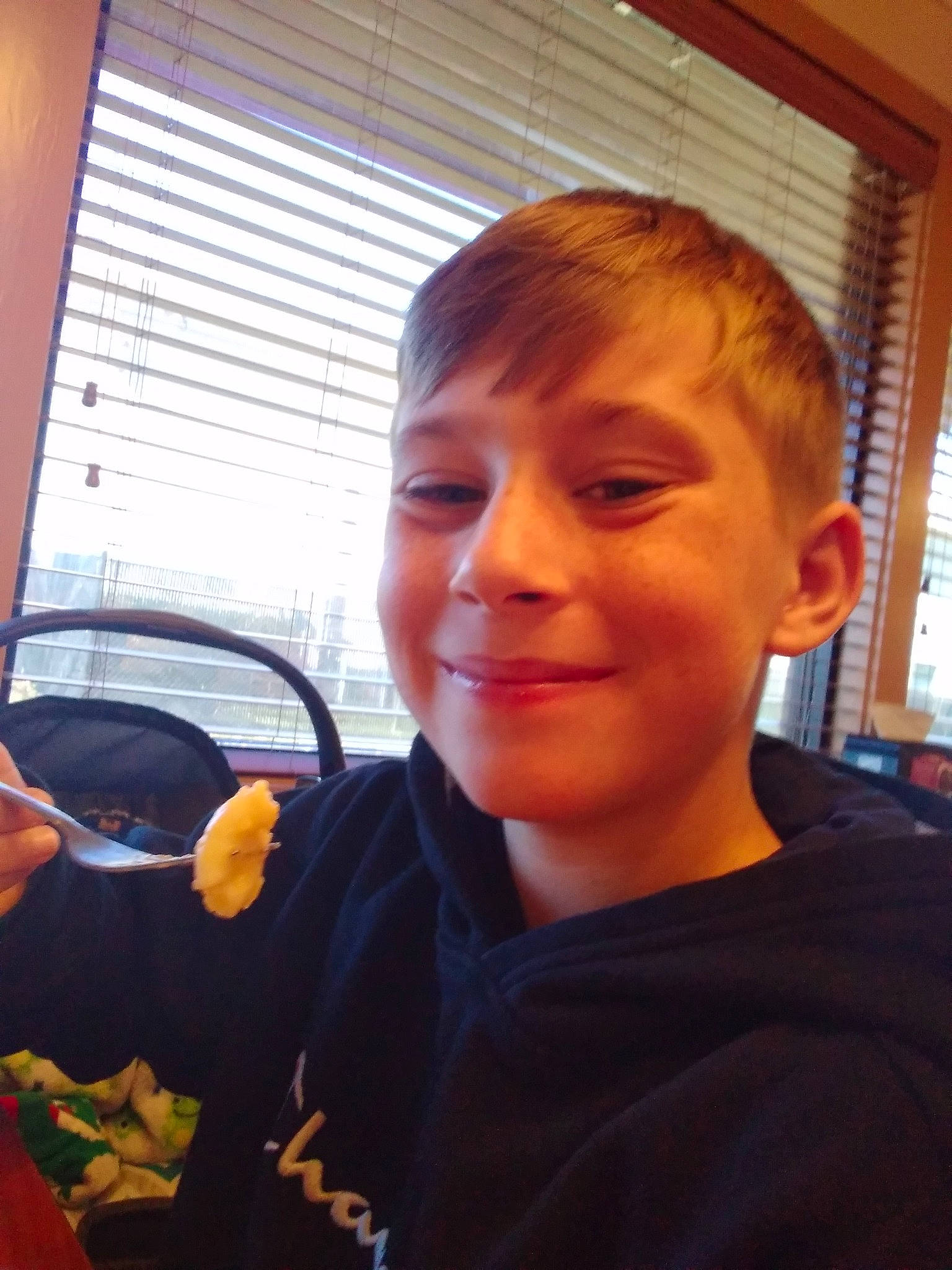 Micheal is registered to the contest to win money with this photo: buzz_cut, child, eyewear, fun, happy, jaw, joy, mouth, nose, person, personal_protective_equipment, room, selfie, smile, t_shirt, vacation, vehicle_door, window, window_blind