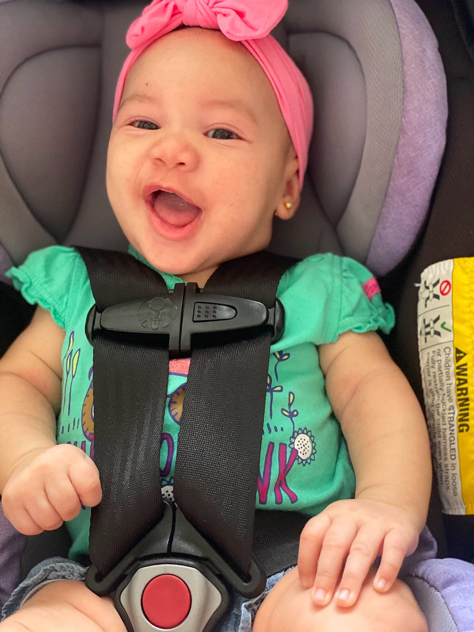Jessica joined the competition — help win amazing prizes! baby, baby_carriage, baby_in_car_seat, baby_toddler_clothing, cheek, child, comfort, cool, face, facial_expression, finger, green, happy, headwear, organ, person, pink, product, purple, skin