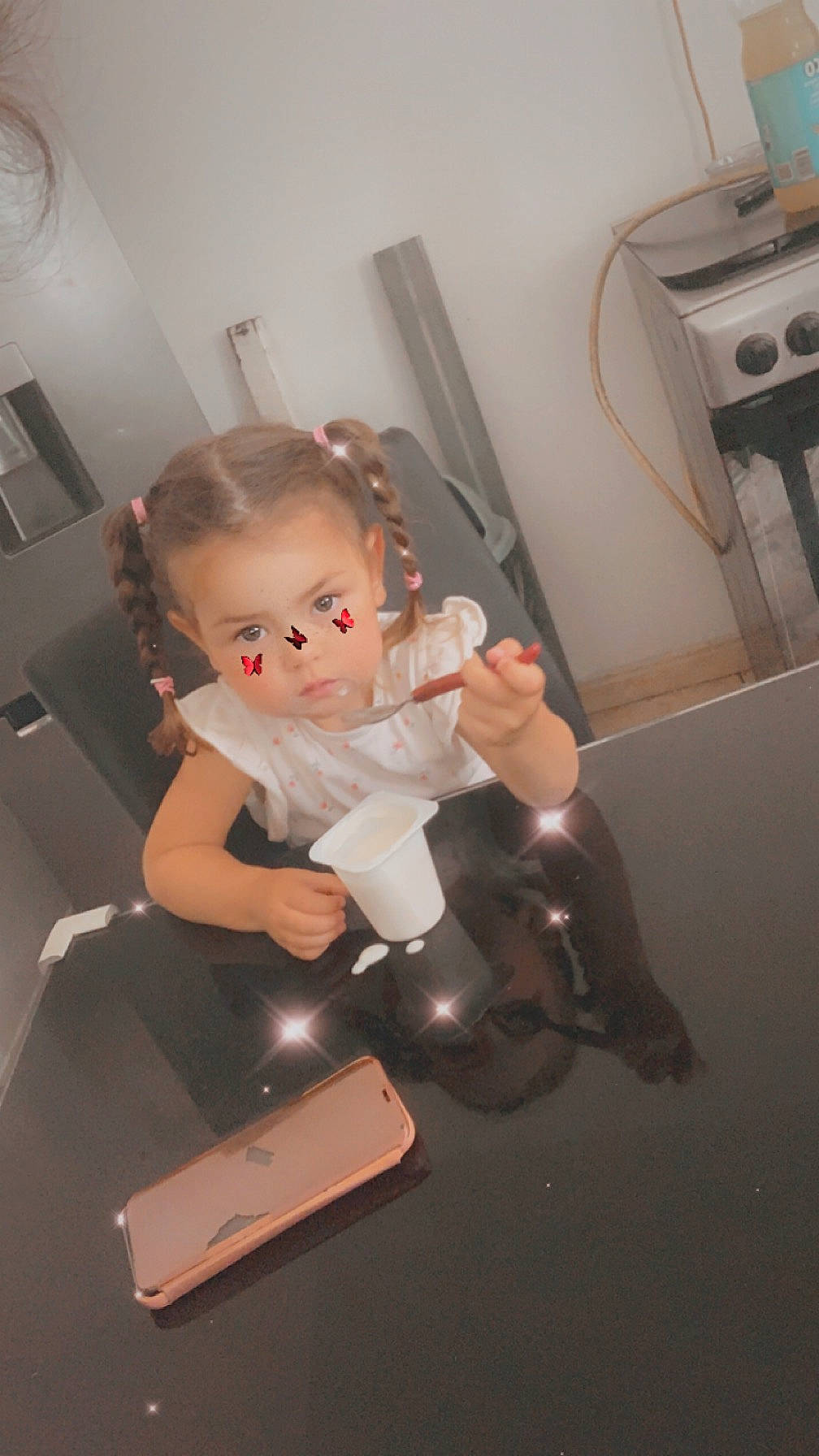 Mya participe au concours pour gagner de l'argent avec cette photo : automotive_design, baby, baby_toddler_clothing, chair, child, comfort, communication_device, dress, eyewear, flash_photography, flooring, formal_wear, fun, home_appliance, mobile_phone, person, portable_communications_device, room, sitting, toddler