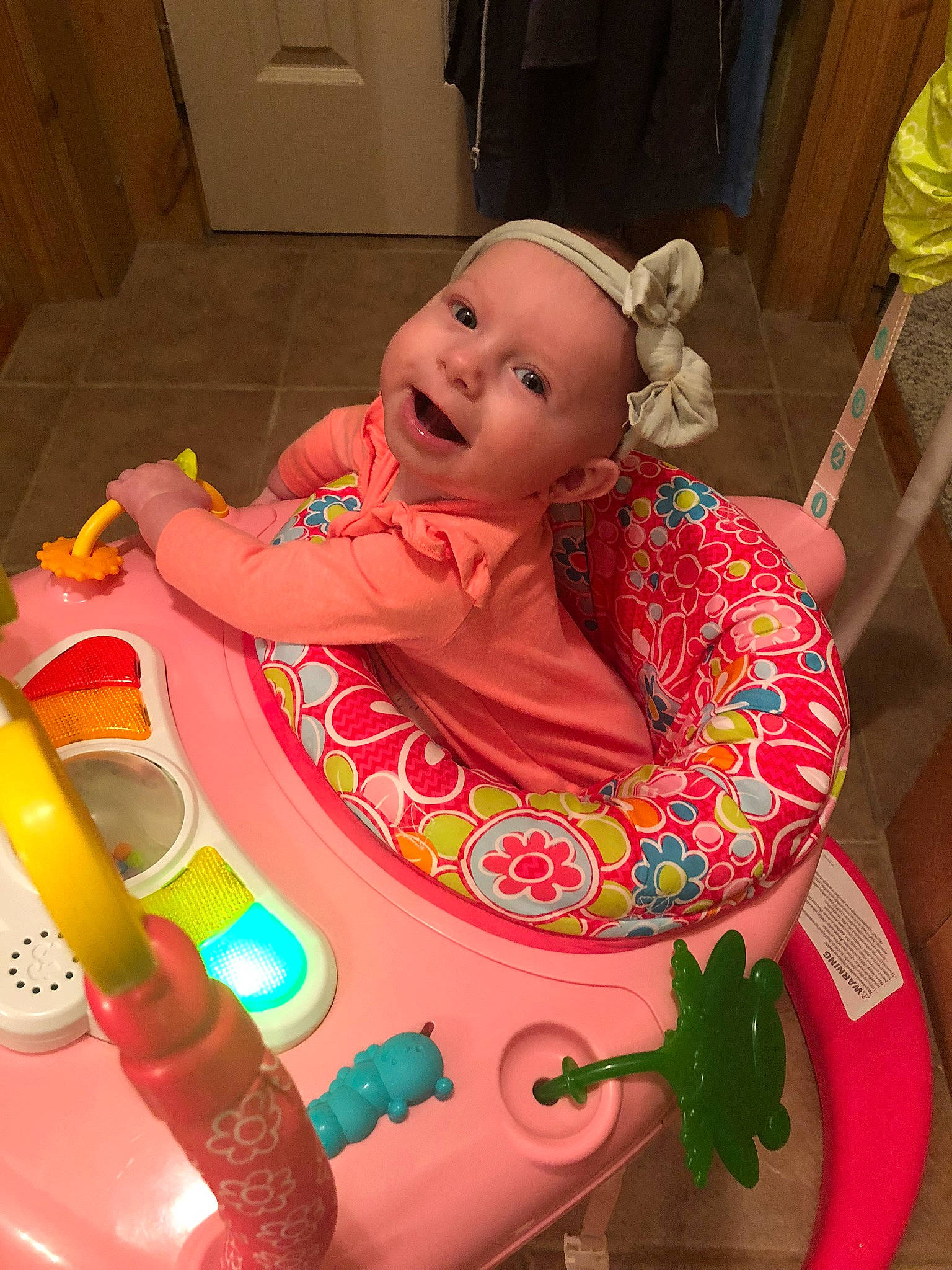 Sadie joined the competition — help win amazing prizes! art, baby, baby_products, baby_toys, bathing, chair, child, entertainment, event, fun, mouth, person, pink, plant, play, room, sitting, smile, sweetness, toddler