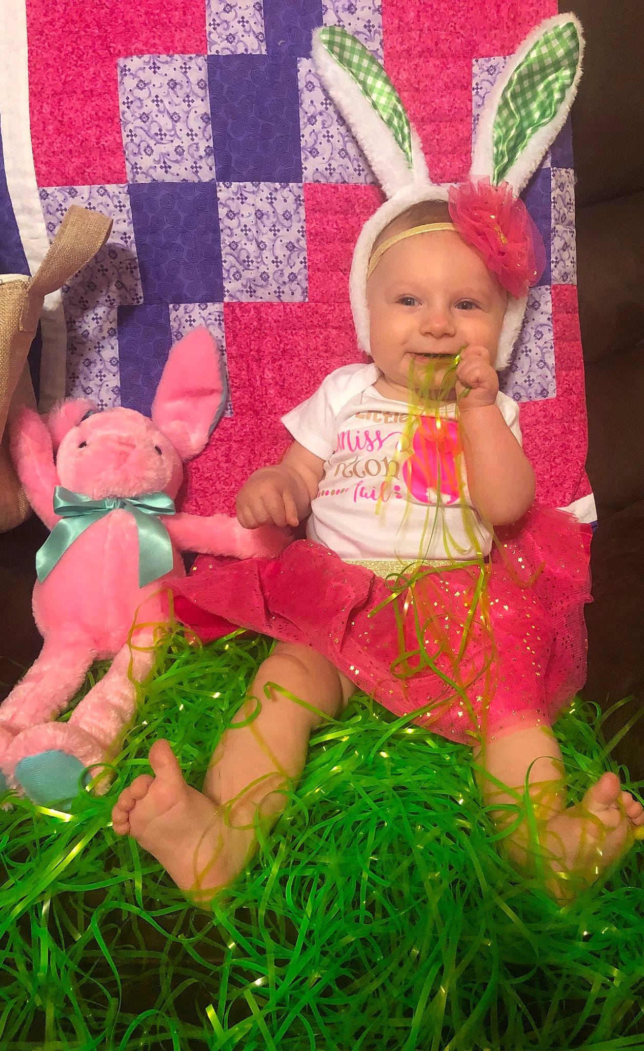 Sadie joined the competition — help win amazing prizes! baby, baby_toddler_clothing, child, event, fun, grass, happy, hat, headwear, human_leg, joy, lap, magenta, pattern, people_in_nature, person, pink, red, skin, smile