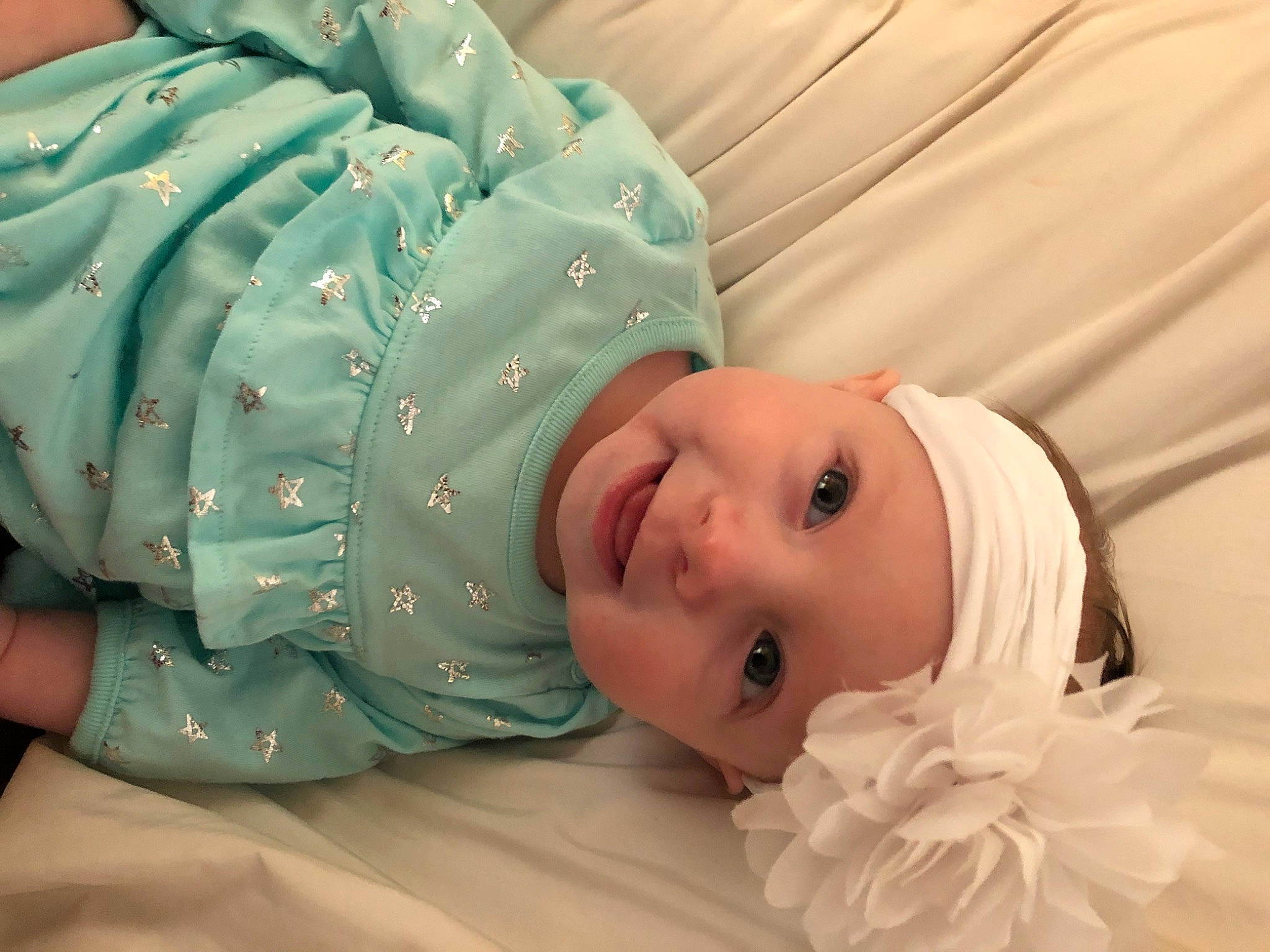 Sadie joined the competition — help win amazing prizes! baby, baby_products, baby_toddler_clothing, cheek, child, chin, comfort, eyelash, fur, happy, hat, headwear, joy, linens, pattern, person, portrait_photography, room, sitting, skin