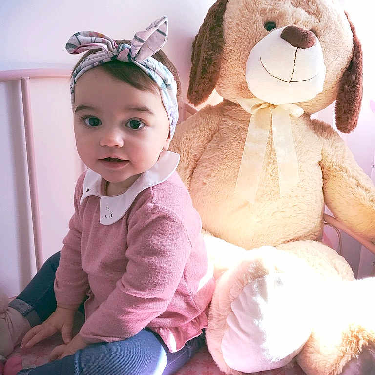 Capucine participe au concours pour gagner de l'argent avec cette photo : baby, child, ear, happy, person, pink, plush, smile, stuffed_toy, teddy_bear, textile, toddler, toy