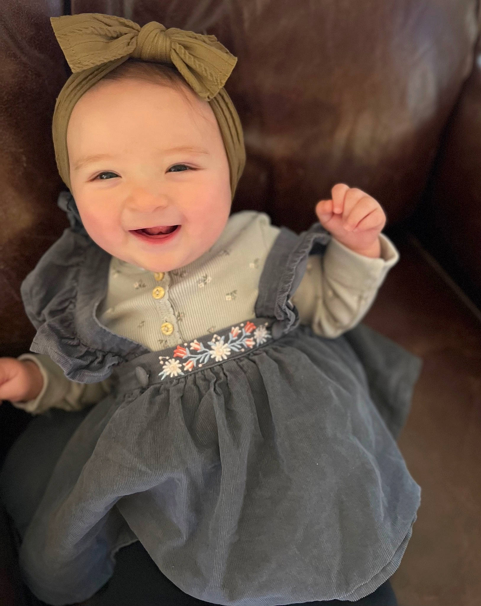 Ren is registered to the contest to win money with this photo: baby, baby_laughing, baby_toddler_clothing, cheek, child, comfort, costume, costume_hat, dress, fashion_accessory, flash_photography, fun, happy, iris, joy, laugh, person, sitting, skin, sleeve