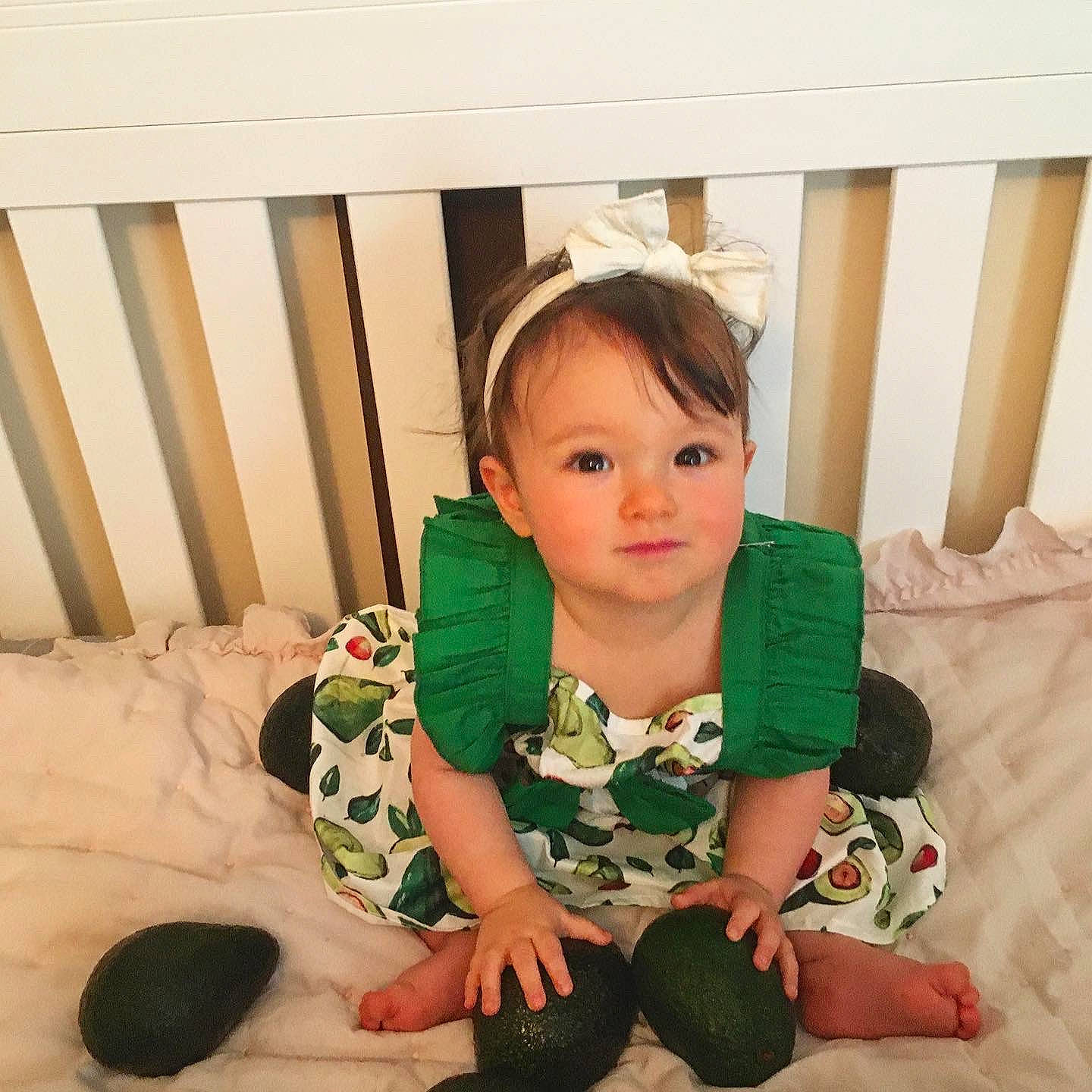 Tsubaki is registered to the contest to win money with this photo: baby, baby_toddler_clothing, child, comfort, eye, face, fashion_accessory, foot, happy, head, human_leg, knee, lap, pattern, person, room, sitting, sleeve, sock, thigh