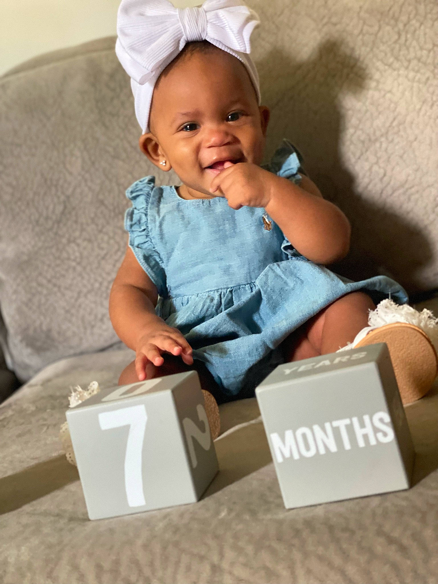 Majesty joined the competition — help win amazing prizes! baby, baby_toddler_clothing, box, cardboard, carton, child, comfort, costume_hat, face, fashion_accessory, fun, happy, packaging_and_labeling, person, product, room, shipping_box, sitting, sleeve, smile