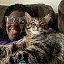casual, cat, closeup, comfort, couch, cozy, feline, friendship, fur, glasses, happy, home, indoor, leisure, person, portrait, relaxation, resting, smile, tabby_cat