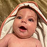 Evangeline is registered to the contest to win money with this photo: baby, infant, face, eyes, skin, towel, bath, expression, open_mouth, curl, blanket, cute, child, person, indoors, soft_texture, happy, newborn, closeup, head