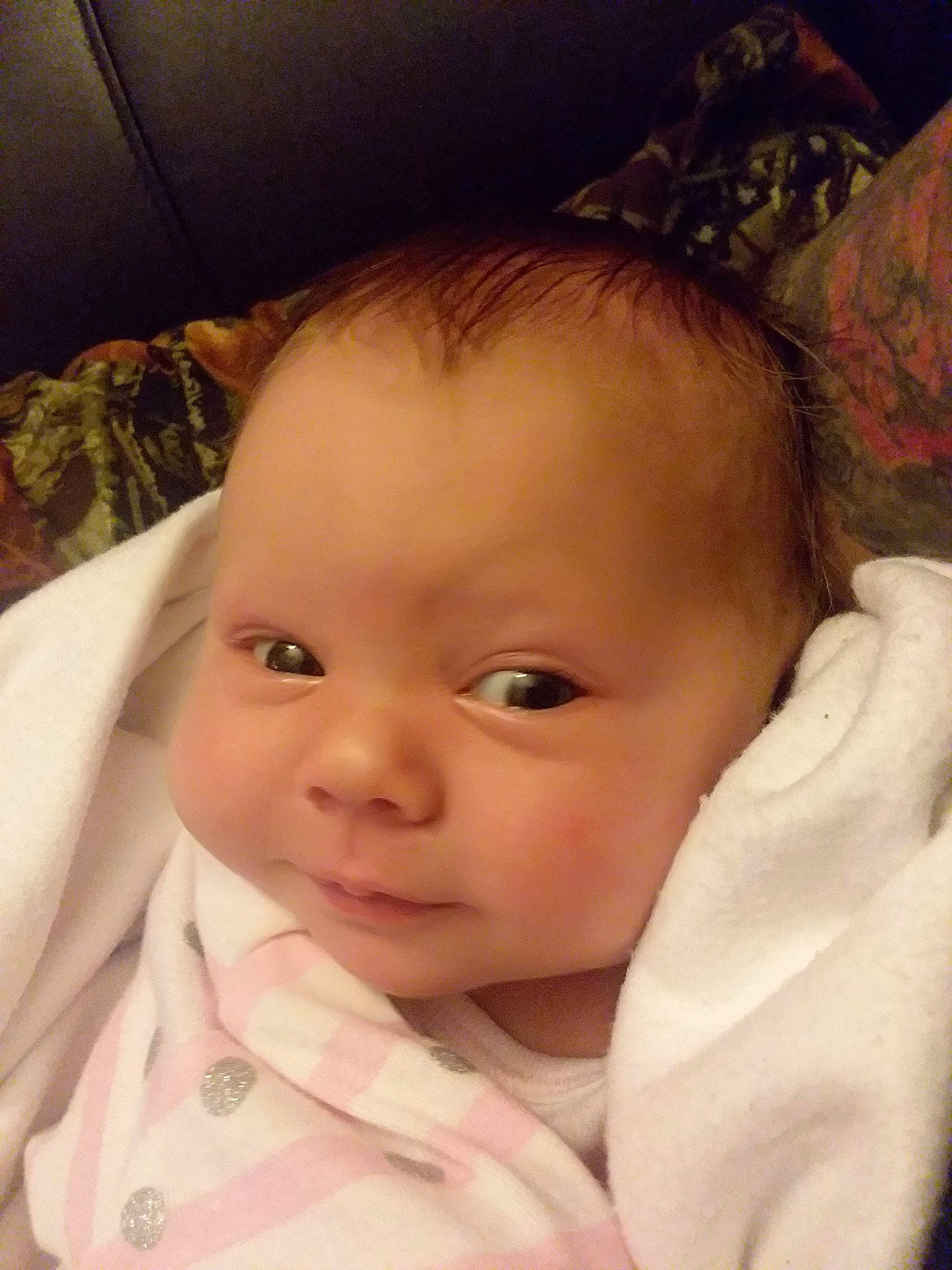 Danika is registered to the contest to win money with this photo: cheek, child, chin, ear, eye, eyebrow, face, finger, forehead, girl, hand, head, human_hair_color, infant, iris, lip, mouth, nose, person, skin