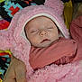 baby, blanket, child, colorful, cozy, cradle, cute, fluffy, hand, hood, infant, pattern, person, pink, resting, sleeping, soft, toddler, warm, wearing