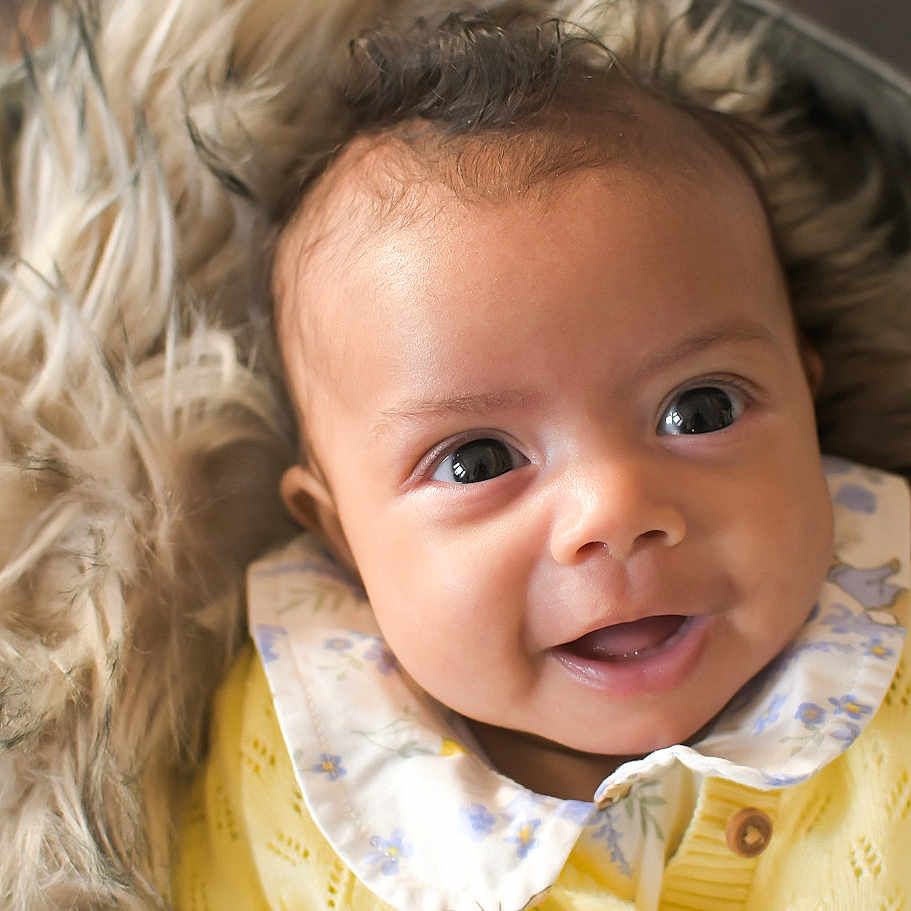 Daisy joined the competition — help win amazing prizes! baby, bodypart, bonnet, clothing, coat, face, happy, hat, head, hood, hoodie, jacket, knitwear, newborn, person, photography, portrait, smile, sweater, sweatshirt