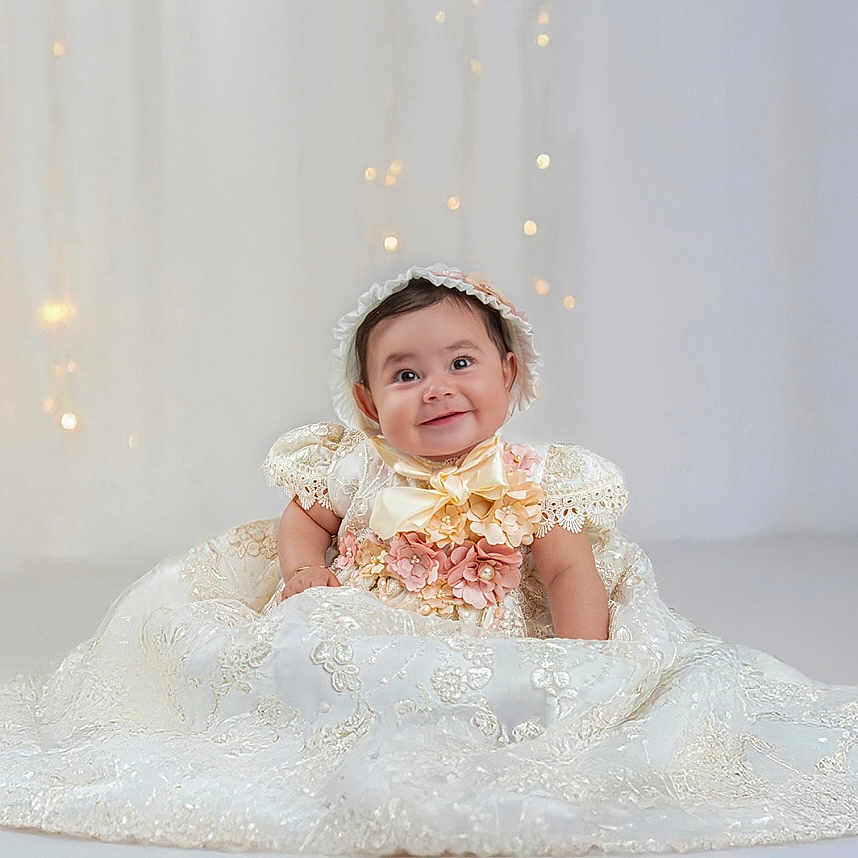 Neyla is registered to the contest to win money with this photo: adult, bonnet, bride, clothing, dress, face, fashion, female, formalwear, gown, happy, hat, head, person, photography, portrait, sitting, wedding, weddinggown, woman