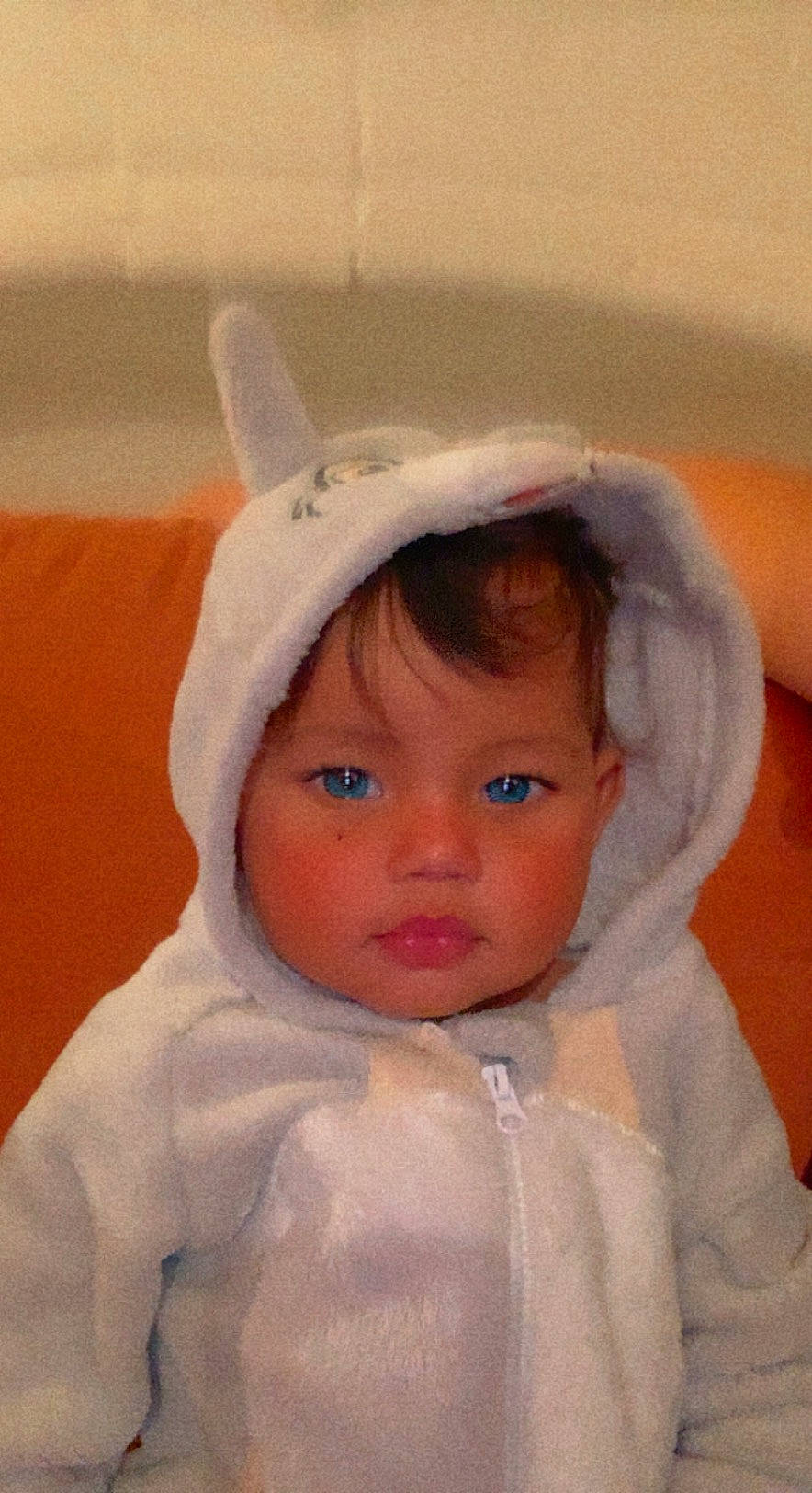 Shyn participe au concours pour gagner de l'argent avec cette photo : baby, baby_toddler_clothing, cheek, comfort, eye, eyebrow, eyelash, face, fur, happy, head, jacket, linens, lip, nose, outerwear, person, skin, sleeve, toddler