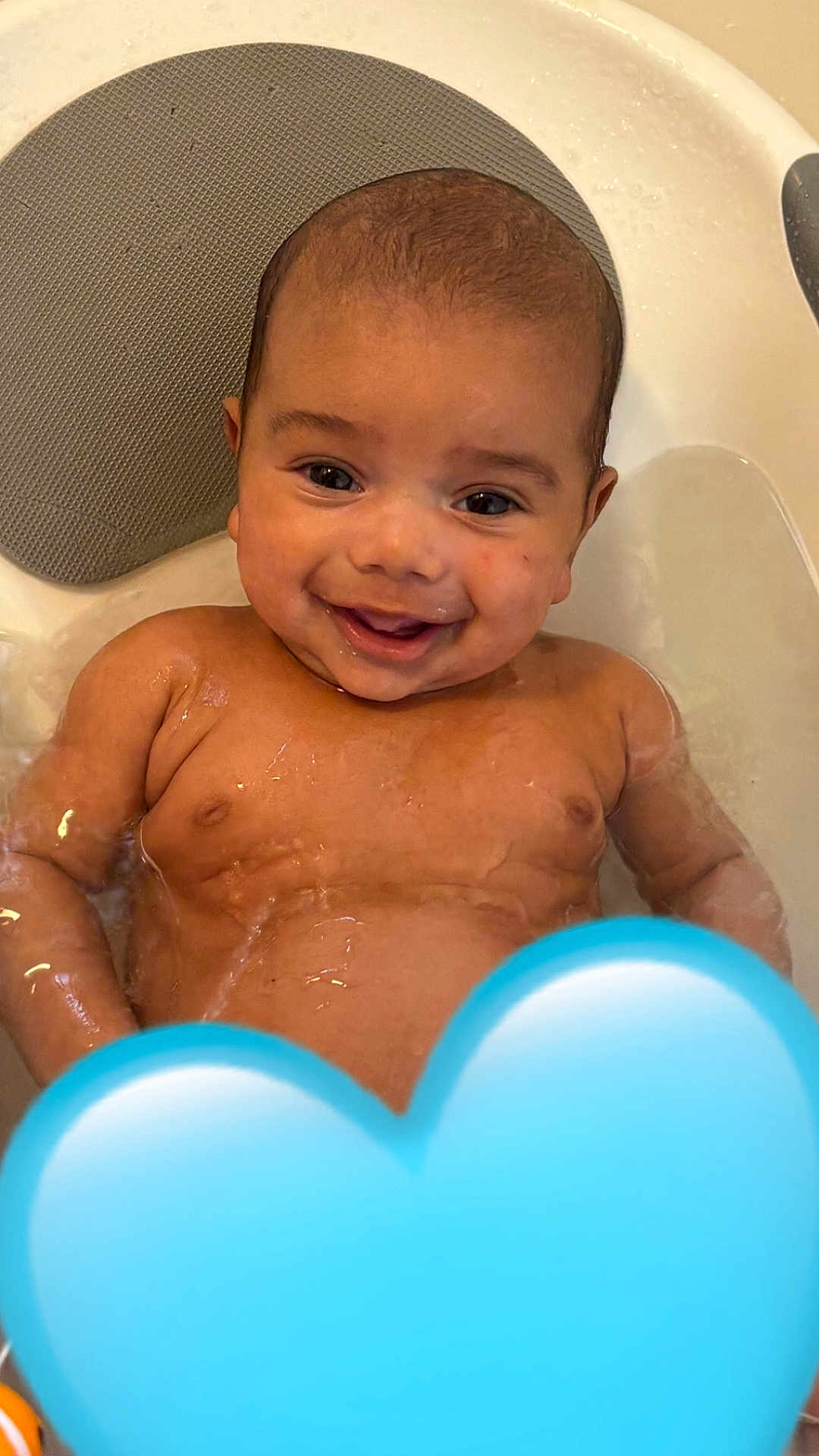 Kylo joined the competition — help win amazing prizes! baby, bath, water, smile, happy, child, skin, face, head, expression, joy, infant, tub, wet, playful, cute, childhood, portrait, closeup, emotion