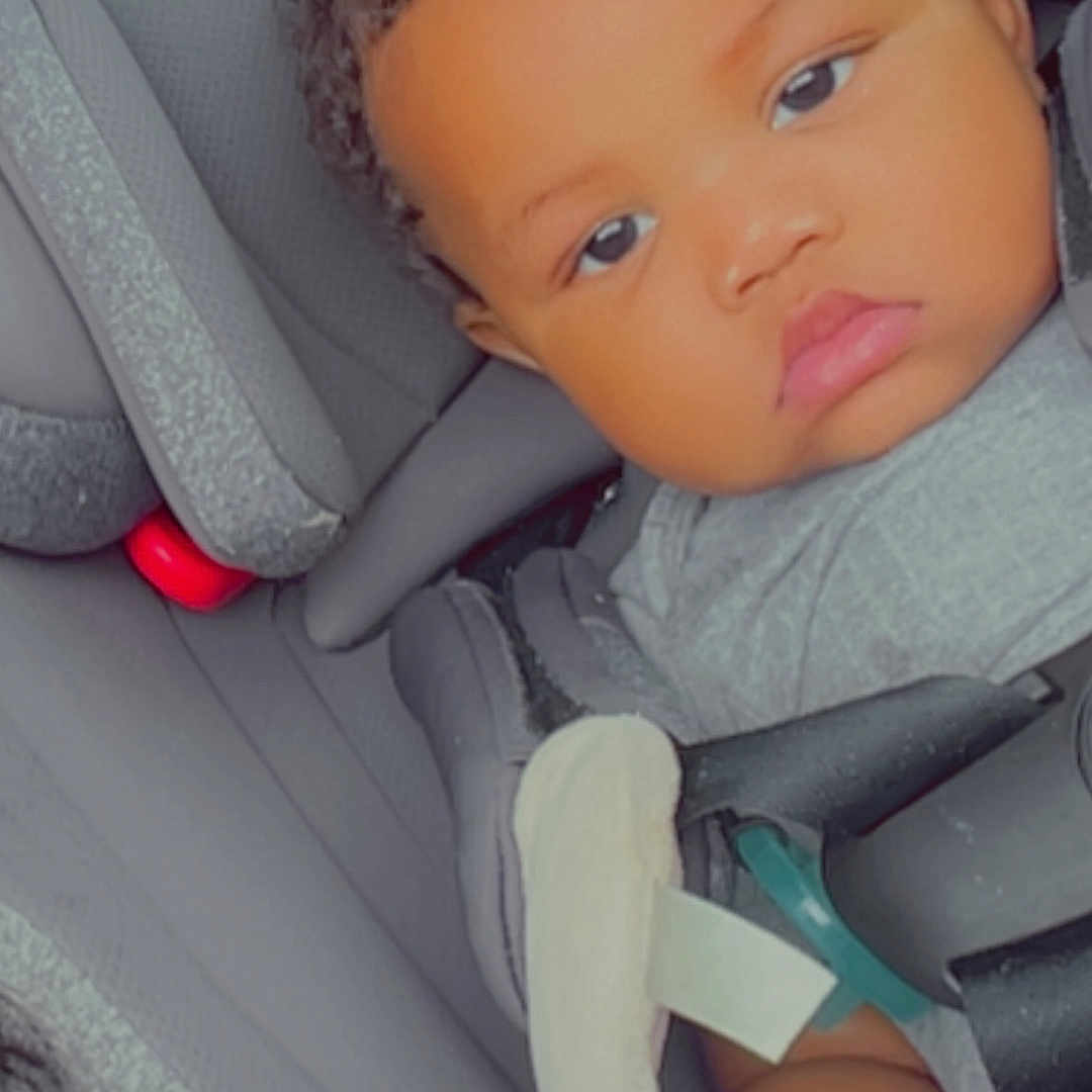 Nishaa is registered to the contest to win money with this photo: accessories, baby, belt, car, car_interior, carseat, cosmetics, cushion, doll, face, head, headrest, homedecor, lipstick, person, photography, portrait, toy, transportation, vehicle