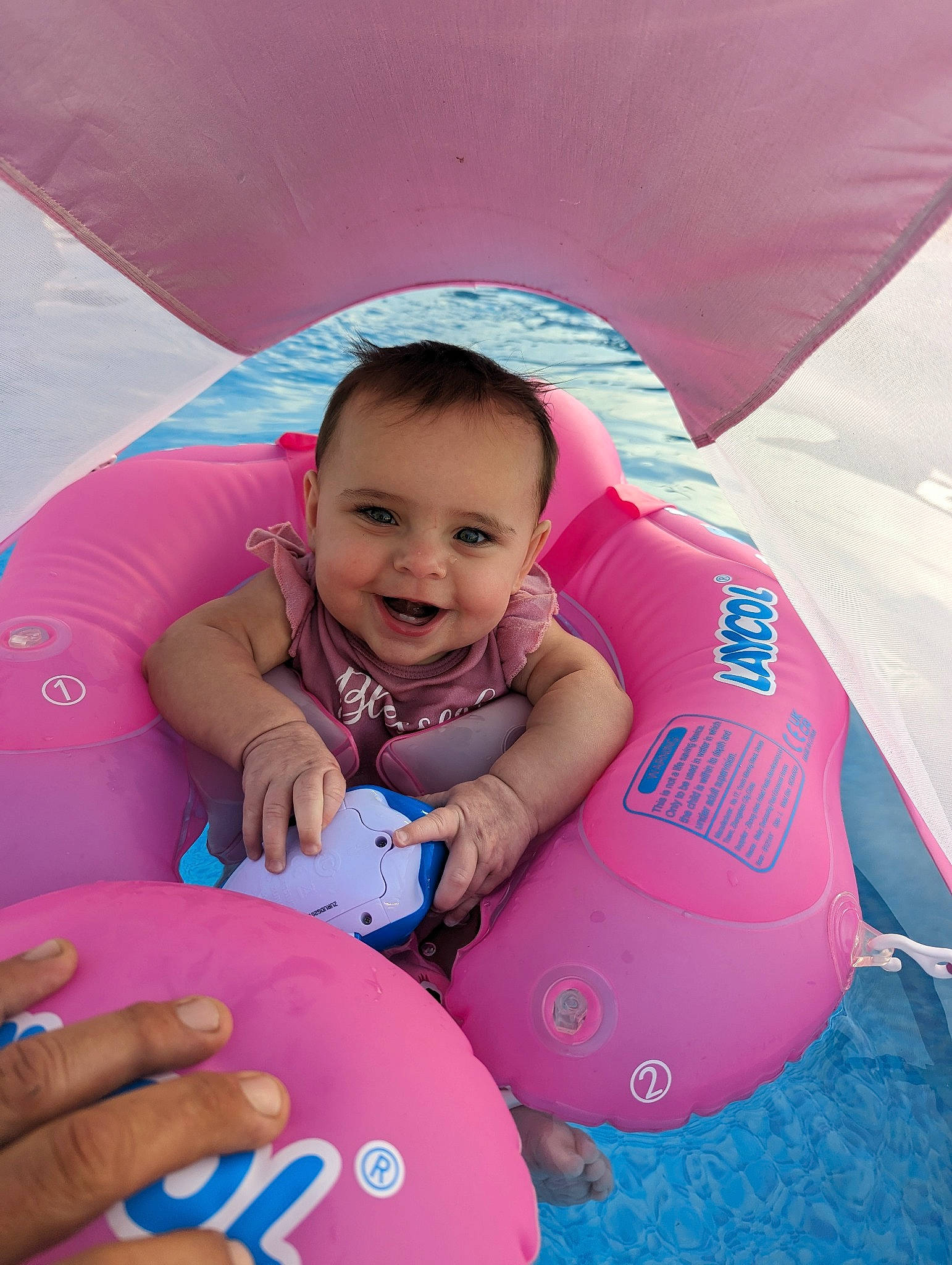 Beretta joined the competition — help win amazing prizes! baby, baby_toddler_clothing, beauty, child, comfort, face, finger, fun, happy, inflatable, joy, leisure, magenta, organ, person, pink, playing_with_kids, product, recreation, skin