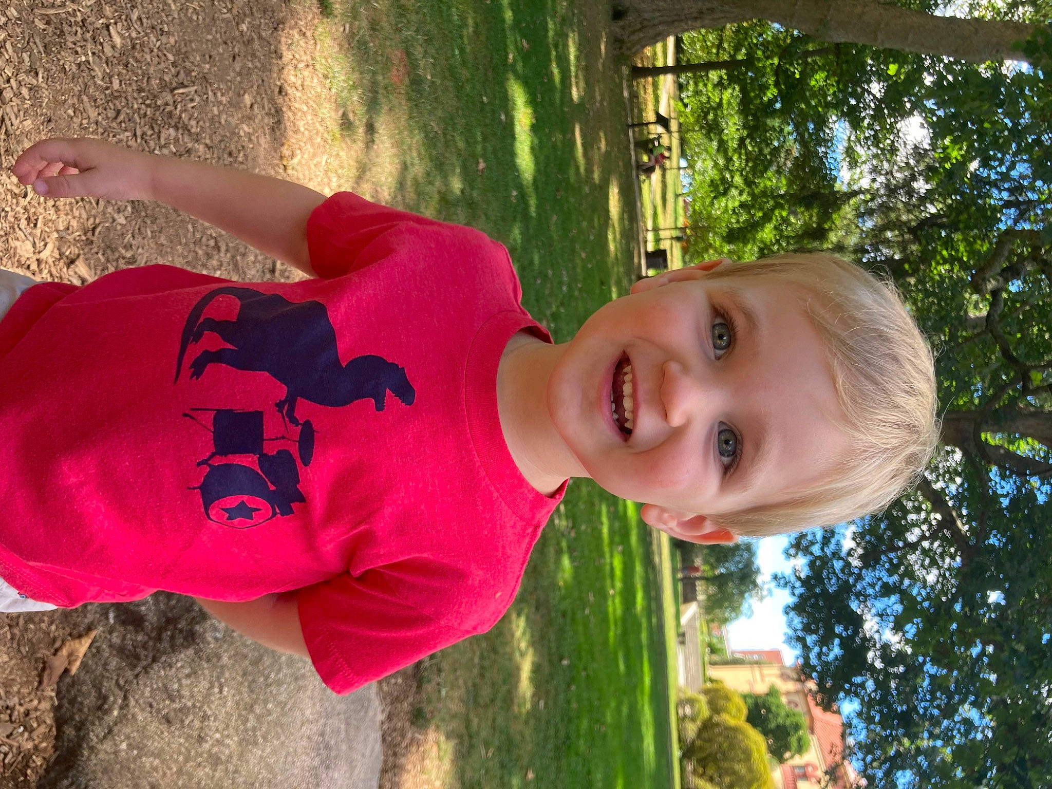 Cody is registered to the contest to win money with this photo: baby_toddler_clothing, child, facial_expression, fun, grass, happy, hat, joy, leaf, leisure, magenta, nose, people_in_nature, person, plant, recreation, smile, spring, summer, t_shirt