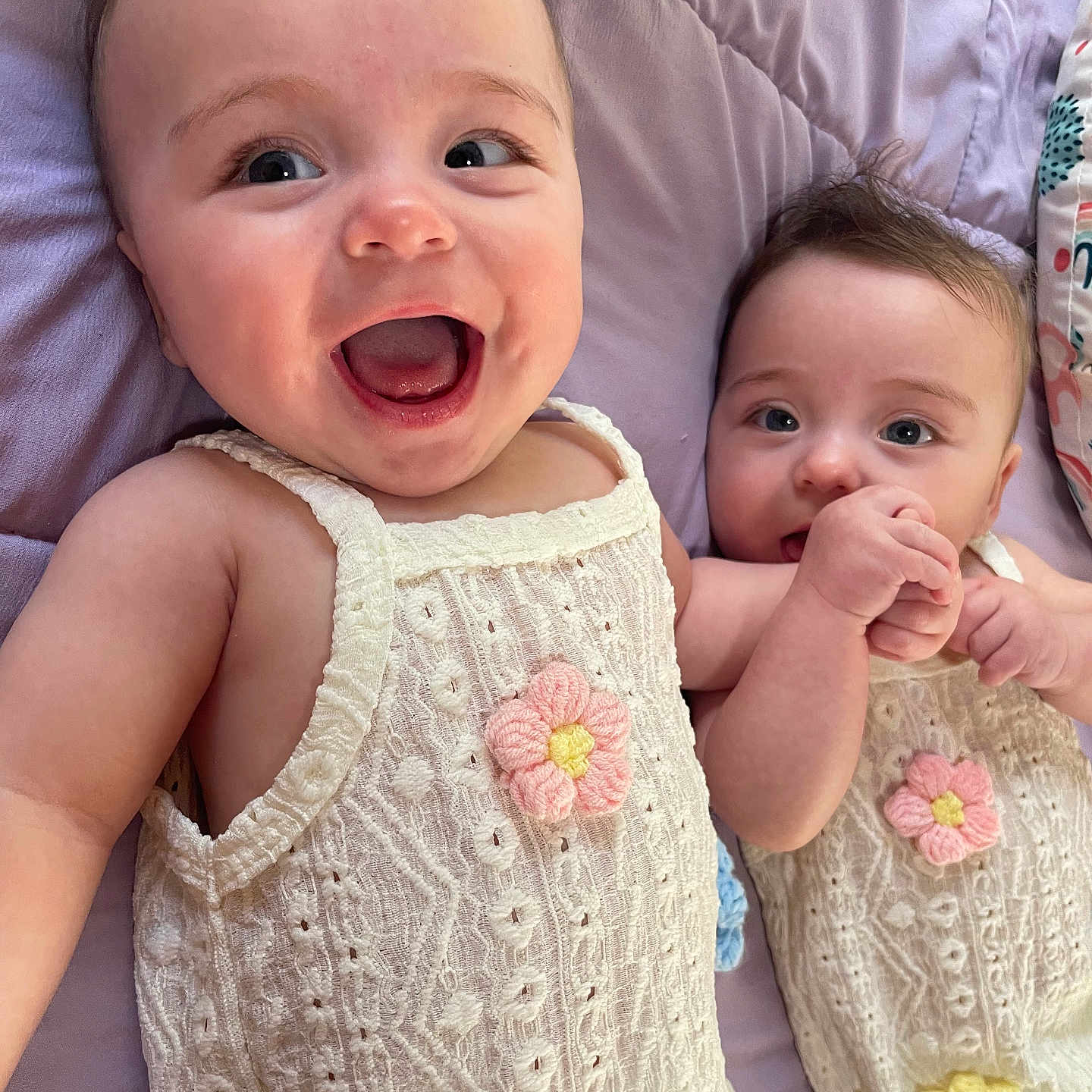 Nitza And Michele is registered to the contest to win money with this photo: baby, babylaughing, bodypart, clothing, couch, dress, face, furniture, happy, head, knitwear, laughing, mouth, newborn, person, photography, portrait, smile, sweater, teeth