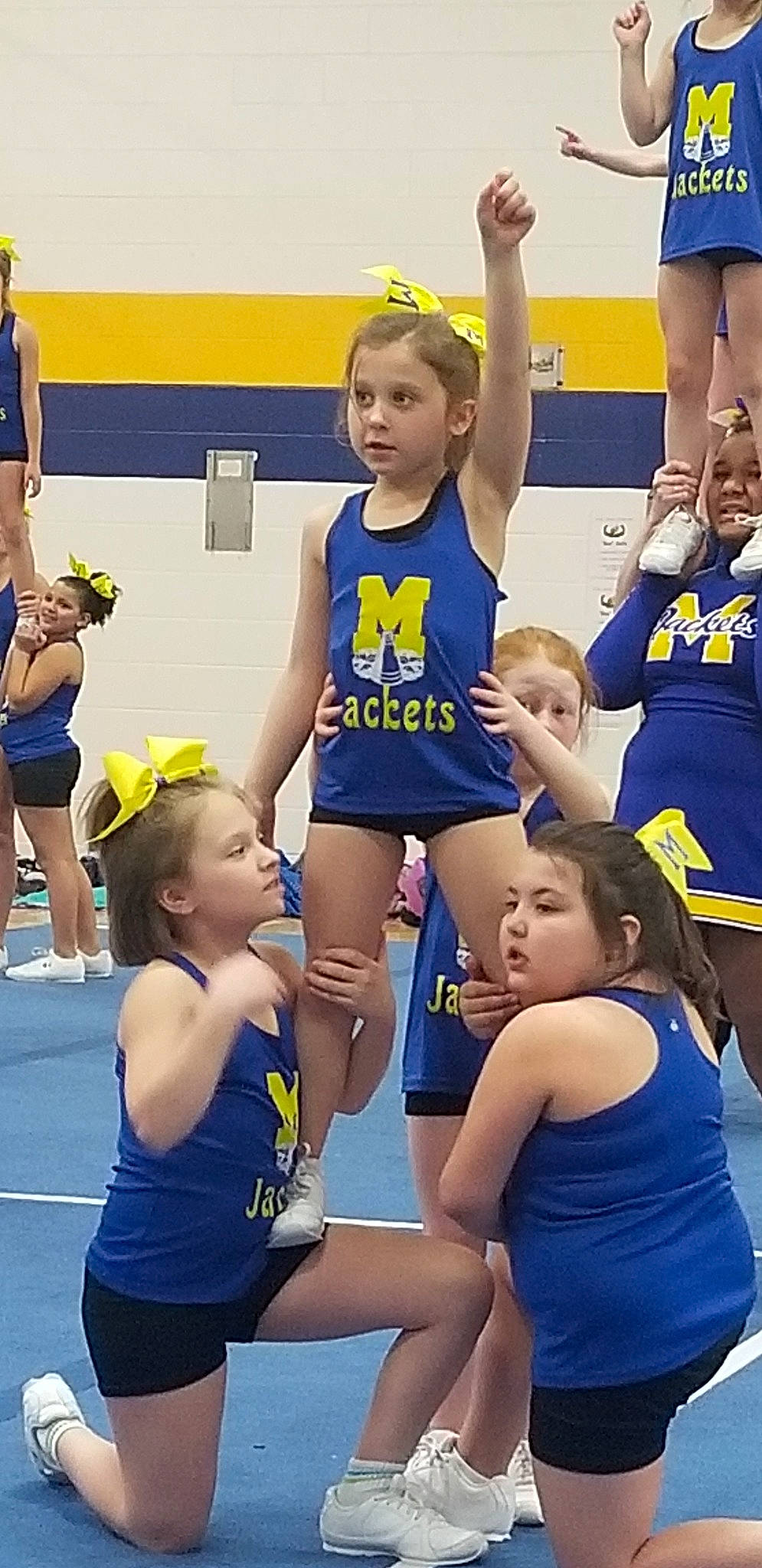 Alida is registered to the contest to win money with this photo: athlete, championship, cheering, cheerleading, competition, competition_event, fun, joy, person, sport_venue, sports, team, team_sport, tournament, uniform