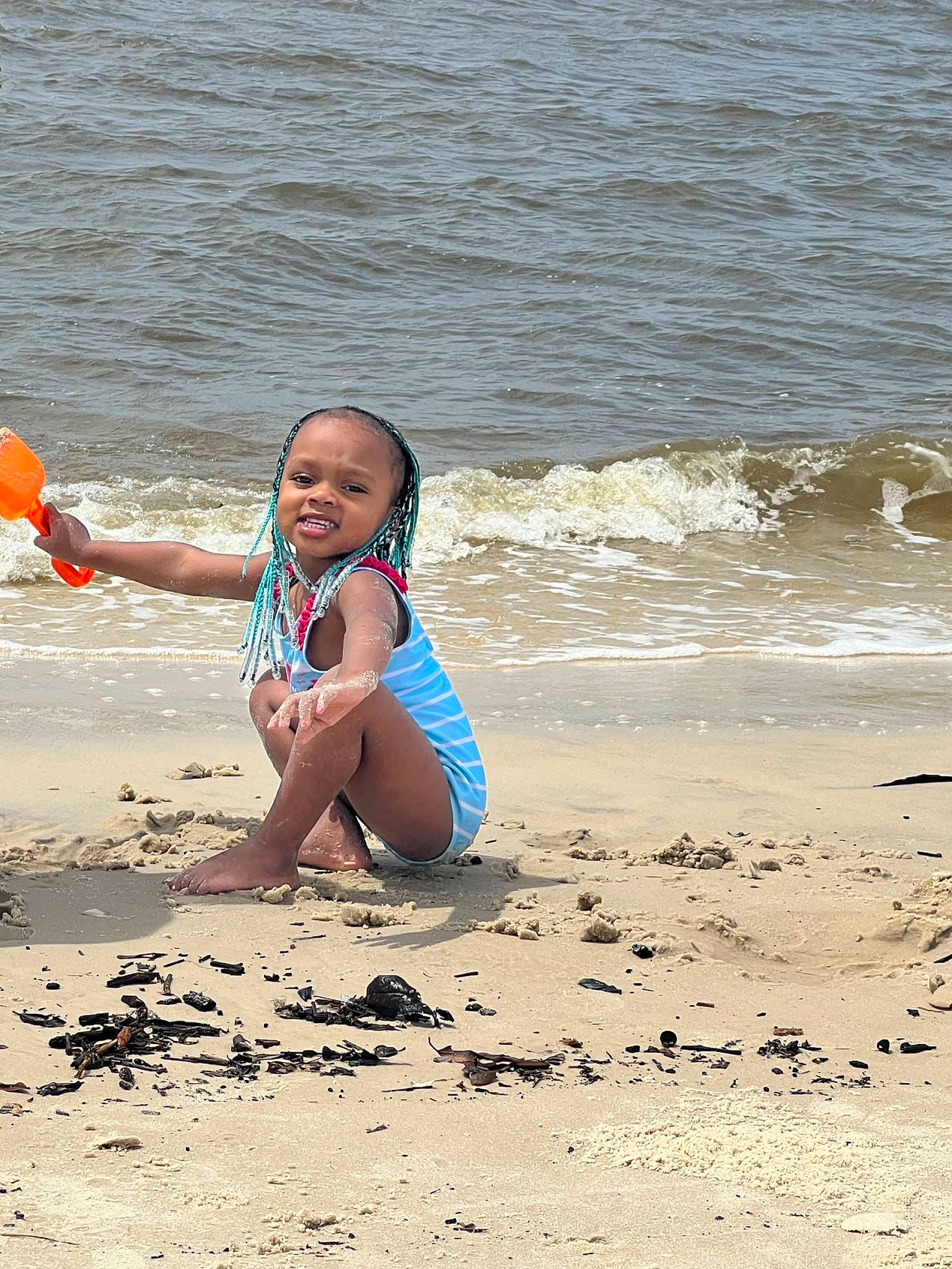 Takaria is registered to the contest to win money with this photo: barefoot, beach, body_of_water, flash_photography, foot, fun, happy, human_leg, lake, leisure, people_in_nature, people_on_beach, person, sand, shore, smile, summer, swimwear, thigh, water