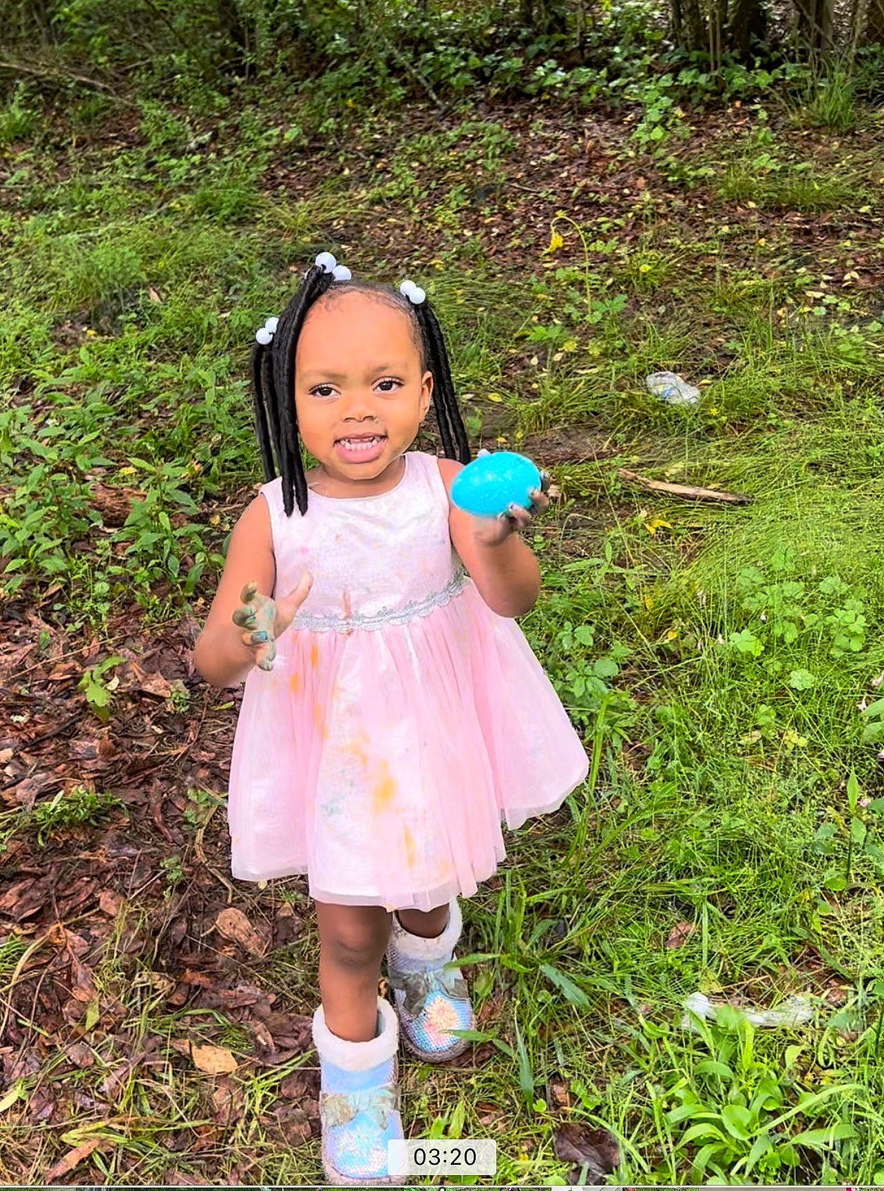 Takaria is registered to the contest to win money with this photo: audio_equipment, baby_toddler_clothing, child, dress, fashion_accessory, fun, grass, grass_family, grassland, happy, headphones, magenta, pattern, people_in_nature, person, plant, smile, sock, terrestrial_plant, toddler