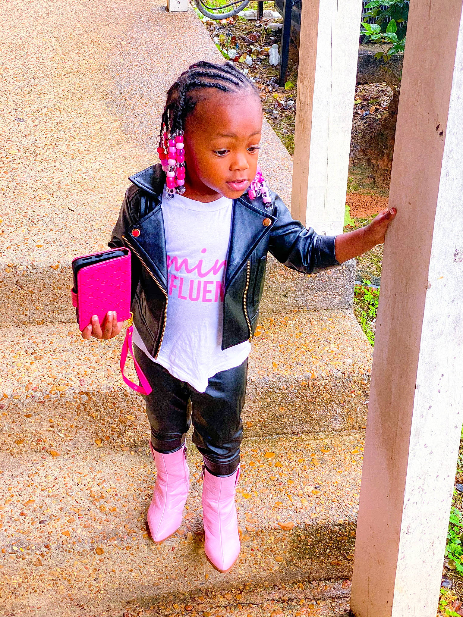 Justice joined the competition — help win amazing prizes! baby_products, baby_toddler_clothing, child, electric_blue, face, fun, grass, happy, head, leisure, magenta, pattern, people_in_nature, person, pink, purple, recreation, sitting, sleeve, street_fashion