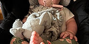 Hope joined the competition — help win amazing prizes! baby, infant, car_seat, pacifier, headband, blanket, plush_toy, legs, feet, floral_leggings, child, cute, comfort, indoor, seat, soft_toy, clothing, baby_accessory, relaxing, portrait