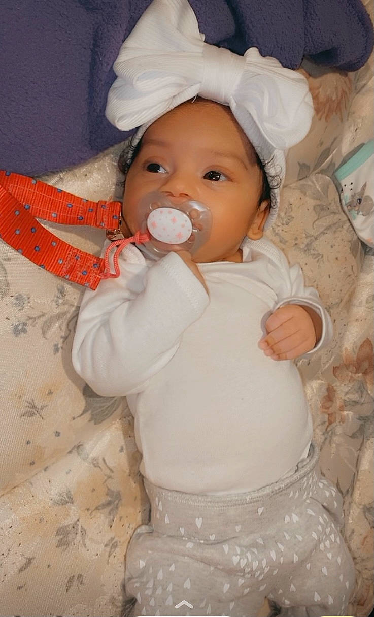 Lamyla joined the competition — help win amazing prizes! baby, baby_products, baby_toddler_clothing, cheek, child, eye, facial_expression, hand, happy, head, headwear, iris, lip, mouth, nose, person, pink, sitting, skin, sleeve