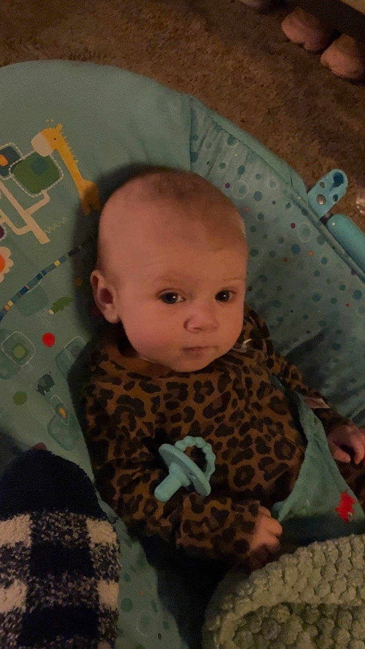 Lennon joined the competition — help win amazing prizes! baby, baby_products, baby_toddler_clothing, cheek, child, comfort, fur, hairstyle, head, headgear, linens, pattern, person, room, sitting, skin, sleeve, toddler, wood, wool