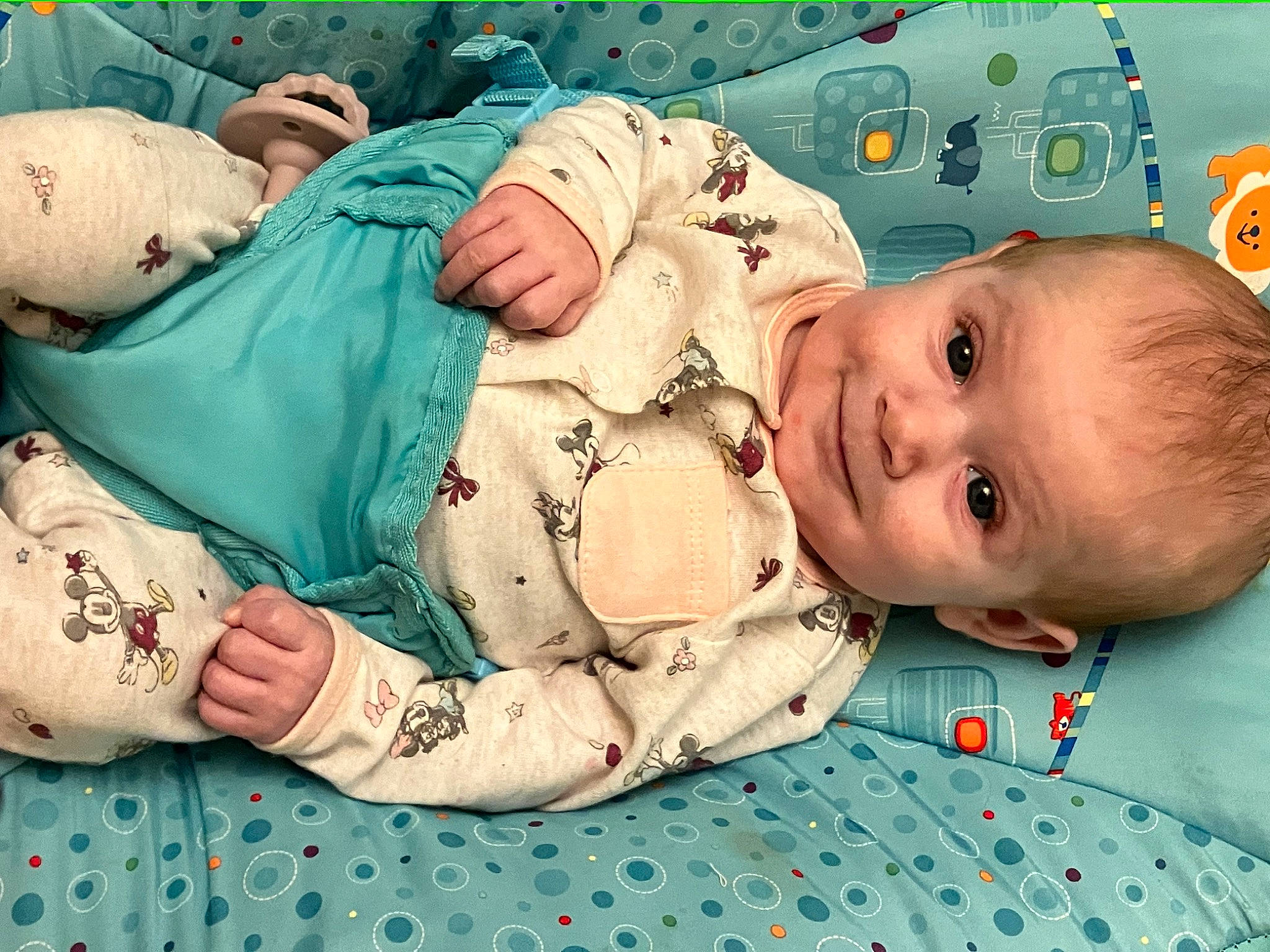 Lennon joined the competition — help win amazing prizes! abdomen, art, baby, baby_products, baby_sleeping, baby_toddler_clothing, blue, cheek, child, comfort, green, happy, linens, mouth, pattern, person, room, skin, smile, textile